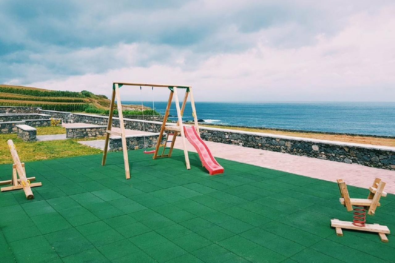 Pedras Do Mar Resort & Spa Fenais da Luz Exterior photo Playground with artificial grass
